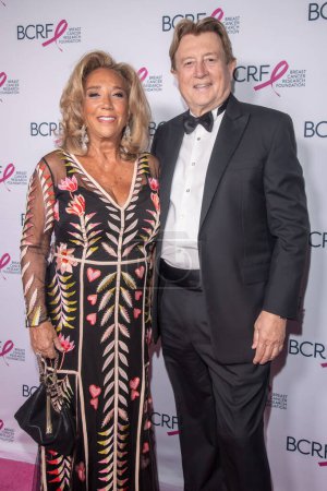 Photo for Breast Cancer Research Foundation Hot Pink Party. May 09, 2023, New York, New York, USA: Denise Rich and Peter Cervinka attend the Breast Cancer Research Foundation Hot Pink Party at The Glasshouse on May 09, 2023 in New York City. - Royalty Free Image