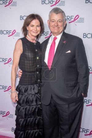 Photo for Breast Cancer Research Foundation Hot Pink Party. May 09, 2023, New York, New York, USA: Lori Kanter Tritsch and William Lauder attend the Breast Cancer Research Foundation Hot Pink Party at The Glasshouse on May 09, 2023 in New York City. - Royalty Free Image