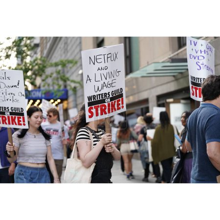 Photo for Writers Guild of America on strike in New York City. May 15, 2023 ,New York , USA: The Writers Guild of America (WGA) went on strike today near the Manhattan Center where the Fox upfront 2023 is being held. - Royalty Free Image