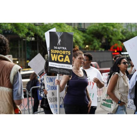 Photo for Writers Guild of America on strike in New York City. May 15, 2023 ,New York , USA: The Writers Guild of America (WGA) went on strike today near the Manhattan Center where the Fox upfront 2023 is being held. - Royalty Free Image