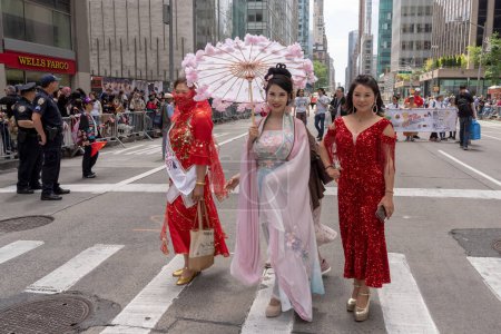 Photo for Second Annual Asian American Pacific Islander (AAPI) Cultural Heritage Parade. May 21, 2023, New York, New York, USA: Participants march at the Second Annual Asian American and Pacific Islander (AAPI) Cultural Heritage Parade on Sixth Avenue - Royalty Free Image