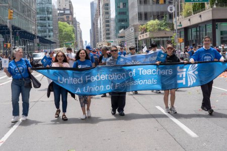 Photo for Second Annual Asian American Pacific Islander (AAPI) Cultural Heritage Parade. May 21, 2023, New York, New York, USA: United Federation of Teachers (UFT) members march at the New York City Second Annual Asian American and Pacific Islander - Royalty Free Image
