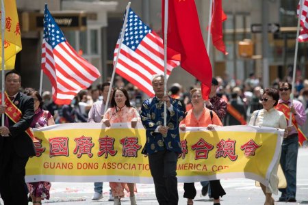 Photo for The Guan Dong Association of America at the second annual AAPI Parade on Sixth Avenue (Avenue of the Americas). May 21, 2023. New York, USA The Asian American and Pacific Islander (AAPI) Cultural and Heritage Parade - Royalty Free Image