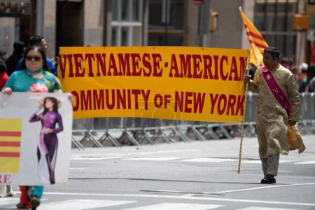 Photo for The Vietnamese community  at the second annual AAPI Parade on Sixth Avenue (Avenue of the Americas). May 21, 2023. New York, USA The Asian American and Pacific Islander (AAPI) Cultural and Heritage Parade - Royalty Free Image