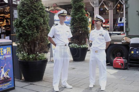 Photo for Fleet Week NYC 2023 at Times Square. May 27, 2023, New York, USA: Fleet Week New York 2023 takes place from May 24 to 30 in which active military ships recently deployed in overseas operations dock in a variety of major cities for one week - Royalty Free Image