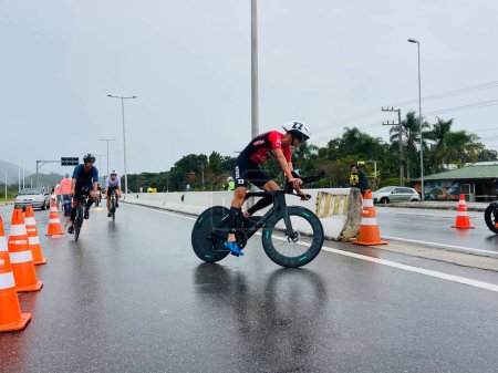 Photo for 21st Edition of Ironman Brazil. May 28, 2023, Florianopolis, Santa Catarina, Brazil: The 21st edition of Ironman Brazil, the competition that brings together around 1,800 athletes from 36 countries, is expected to go on until the end of the day - Royalty Free Image