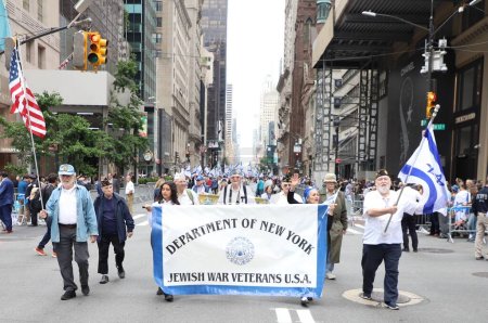 Photo for Celebrate 75th Israel Parade: Reviewing The Hope with Protest. June 4, 2023, New York, USA: Jewish people are celebrating 75 years of Israel existence between 57th and 74th streets on 5th avenue New York . - Royalty Free Image