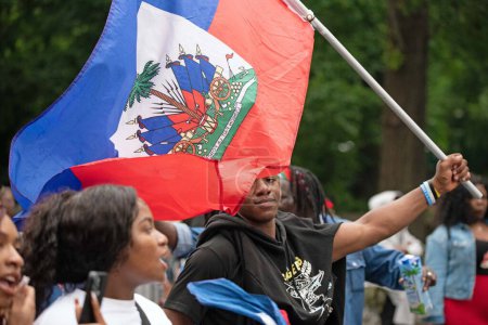 Photo for Haitian Parade in New York City. June 3, 2023, New York, USA: Commemorates the first most successful slave rebellion in the western hemisphere. The rebellion began in 1791 and ended in 1803 - Royalty Free Image