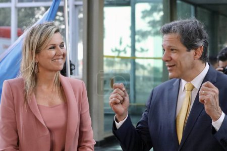 Photo for Queen Maxima of the Netherlands visits the Ministry of Finance in Brasilia. June 6, 2023. Brasilia, Federal District, Brazil: Queen Maxima of the Netherlands and Minister of Finance of Brazil Fernando Haddad speak to the press after the visit - Royalty Free Image