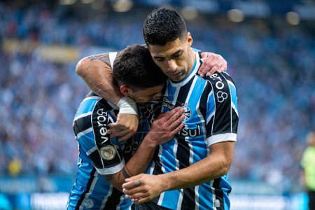 Photo for PORTO ALEGRE (RS), Brazil 06/25/2023 - Suarez scores and celebrates another goal with Gremio's shirt in a match against Coritiba, valid for the twelfth time of the Brasileirao, held at Arena do Gremio - Royalty Free Image