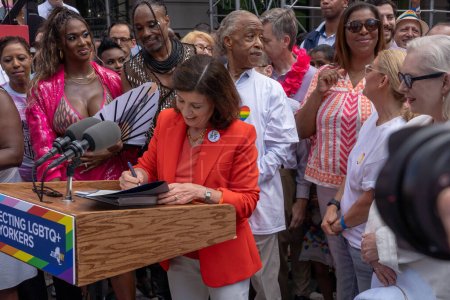 Photo for 2023 New York City Pride March. June 25, 2023, New York, New York, USA: New York Governor Kathy Hochul signs a legislation establishing the Empire State as a Safe Haven for Trans Youth before the annual New York City Pride Parade - Royalty Free Image