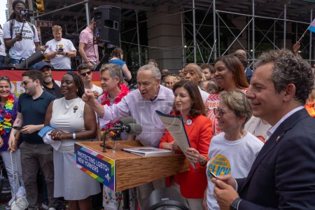 Photo for 2023 New York City Pride March. June 25, 2023, New York, New York, USA: Senate Majority Leader, U.S. Senator Chuck Schumer (D-NY) speaks to members of the media during a signing a legislation establishing the Empire State - Royalty Free Image