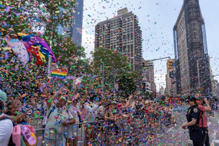 Photo for 2023 New York City Pride March. June 25, 2023, New York, New York, USA: Spectators with pride flags watch the annual New York City Pride Parade on June 25, 2023 in New York City. - Royalty Free Image