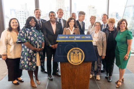 Photo for Governor Hochul Announces First-In-Nation Congestion Pricing Will Move Forward. June 27, 2023, New York, New York, USA: New York State Governor Kathy Hochul (C) and local politicians pose after announcement on first-in-nation congestion - Royalty Free Image