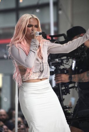 Photo for (NEW) Karol G performs LIVE on the TODAY show. June 30, 2023, New York , USA: Karol G performs LIVE on the TODAY show at Rockefeller plaza in New York with the presence of many fans who crowded the plaza and all surrounding streets - Royalty Free Image