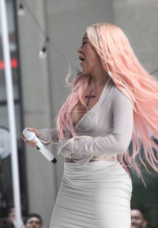 Photo for (NEW) Karol G performs LIVE on the TODAY show. June 30, 2023, New York , USA: Karol G performs LIVE on the TODAY show at Rockefeller plaza in New York with the presence of many fans who crowded the plaza and all surrounding streets - Royalty Free Image