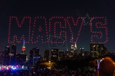 Photo for (NEW) New York City Celebrates Independence Day. July 04, 2023, New York, New York, USA: Drones perform a light show before the annual Macy's 4th of July Fireworks display overlooking the Manhattan skyline at Gantry State Plaza Park in Long Island - Royalty Free Image