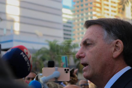 Photo for Brasilia (DF), Brazil - 07/12/2023 - POLITICS/PF/BOLSONARO - Former President of the Federative Republic of Brazil Jair Messias Bolsonaro speaks to the press on his way out after giving testimony to the PF this Wednesday, July 12, 2023 - Royalty Free Image