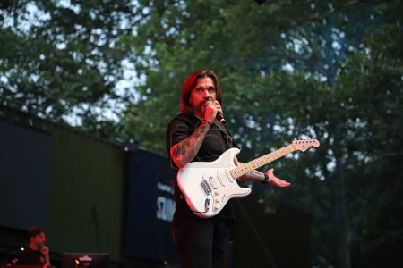 Photo for (NEW) Juanes Summerstage Show canceled due to excessive crowds at Central Park. July 12, 2023, New York, USA: Colombian famous singer, Juanes expected Summerstage show was canceled due to excessive crowd at Rumsey Playfield in Central Park, New York - Royalty Free Image