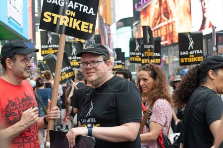 Photo for (NEW)  SAG-AFRA Strike in New York. July 19, 2023, New York, USA: The Screen Actors Guild- American Federation of Television and Radio Artists went on strike over an ongoing labor dispute with the Alliance of Motion Picture and Television Producers. - Royalty Free Image