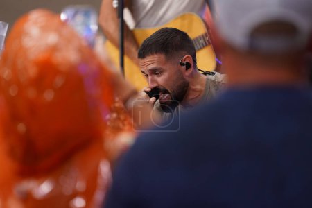 Photo for Dan + Shay Performed live Citi Concert Series on the Today Show at Rockefeller Plaza, July 21, 2023, New York , USA: Despite the rain, Dan & Shay stole the show this morning at Rockefeller Plaza on the Today Show. - Royalty Free Image
