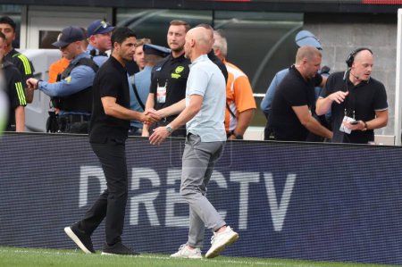 Photo for New Jersey (USA), 07/22/2023 - Coaches Mikel Arteta and Erik ten Hag shake hands at the end of the match between the English giants Manchester United against Arsenal - Royalty Free Image