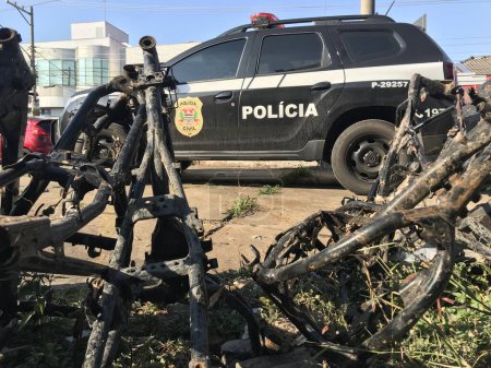 Photo for (INT) Military Police Recovered 150 Abandoned Motorcycle Frames in Sao Paulo. July 24, 2023, Sao Paulo, Brazil: Military Police recovered 150 frames of motorcycles abandoned on land in the northern part of the city in Taipas. - Royalty Free Image