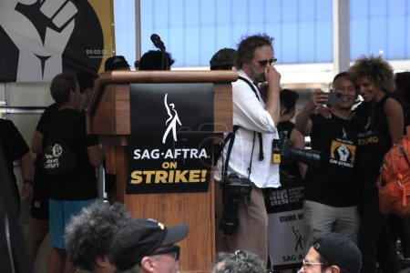 Photo for (NEW) SAG-AFTRA On Strike Massive, Star-Studded Rally In Times Square. July 25, 2023, New York, USA: SAG-AFTRA held a mass strike rally in Times Square on Tuesday (25) morning, expected to be the biggest rally in NYC since the strike began on July 14 - Royalty Free Image