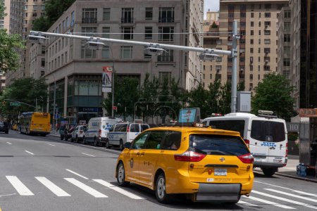 Photo for New Congestion Pricing Toll Readers. July 30, 2023, New York, New York, USA: Newly installed Congestion pricing plate readers and EZ-Pass scanners are seen on Broadway and 61st Street in Manhattan on July 30, 2023 in New York City. - Royalty Free Image