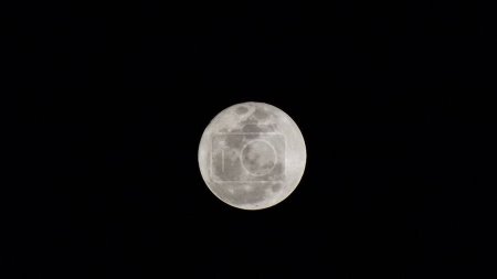 Photo for Super Moon Seen in Rio de Janeiro. August 01, 2023, New York, USA: Super Moon seen from Rocha Miranda neighborhood in Rio de Janeiro at dawn on Wednesday (02). - Royalty Free Image