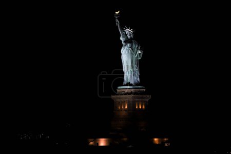 Photo for Super Moon Seen in New York. August 01, 2023, New York, USA: Super Moon seen from around Statue of Liberty in New York on Tuesday night (01). - Royalty Free Image