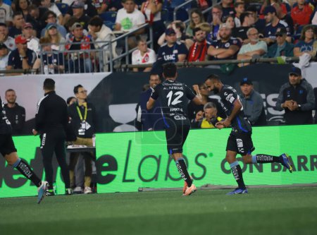 Photo for Leagues Cup: Queretaro vs New England. August 07, 2023, Boston, Massachusetts, USA: Jaime Gomez Valencia (Queretaro) celebrates his goal with team players during soccer match between Queretaro and New England - Royalty Free Image