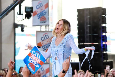 Photo for Kelsea Ballerin Performs live on Today Show. Agost 11, 2023, New York, USA: Kelsea Ballerin performs at the Citi Concert Series live on TODAY Plaza in Rockefeller center with the presence of fans screaming and singing all their songs. - Royalty Free Image