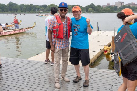 Photo for Hong Kong Dragon Boat Festival in New York (HKDBF-NY). August 12, 2023, New York, New York, USA:Queens borough president Donovan Richards and New York City Comptroller Brad Lander pose during the 31st Hong Kong Dragon Boat Festival in New York - Royalty Free Image