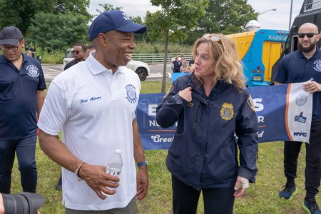 Photo for Hong Kong Dragon Boat Festival in New York (HKDBF-NY). August 12, 2023, New York, New York, USA:New York City Mayor Eric Adams (L) greets Queens District Attorney Melinda Katz during the 31st Hong Kong Dragon Boat Festival in New York - Royalty Free Image