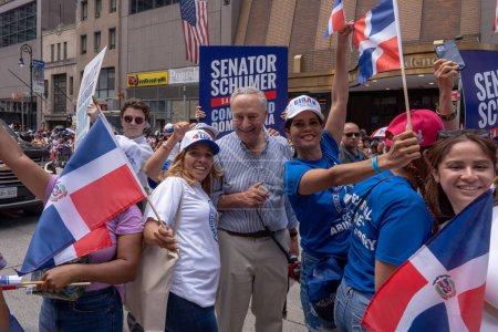 Photo for 41st National Dominican Day Parade 2023. August 13, 2023, New York, New York, USA: Senate Majority Leader, U.S. Senator Chuck Schumer marches up 6th Avenue at the Dominican Day Parade on 6th Avenue on August 13, 2023 in New York City. - Royalty Free Image