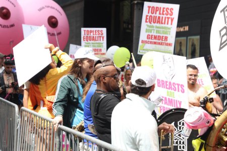Photo for International Go Topless Day in New York. August 26, 2023, New York, USA: U.S. based organization founded in 2007 by spiritual leader Rael, organized a Go Topless March in New York - Royalty Free Image