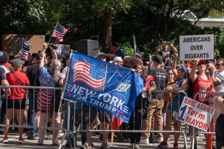 Photo for Protesters Clash Over Migrant Crisis Outside Gracie Mansion. August 27, 2023, New York, New York, USA: People participate in an anti-migrant rally and protest outside of Gracie Mansion on August 27, 2023 in New York City. - Royalty Free Image