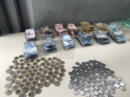Photo for Police Arrest 2 Female Drug Dealers in Cracolandia. August 27, 2023, Sao Paulo, Brazil: Arrest of two female drug dealers, in Cracolandia, with a large amount of drugs and money where they were detained and taken to the 77th Police Precinct - Royalty Free Image