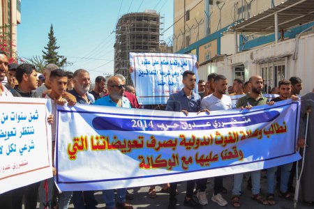 Photo for Palestinian Houses Owners Protest in Gaza. September 07, 2023, Gaza, Palestine: Palestinian owners of houses which were destroyed during the Israeli war of 2014, take part in a protest demanding for reconstruction of their houses - Royalty Free Image