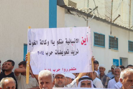 Photo for Palestinian Houses Owners Protest in Gaza. September 07, 2023, Gaza, Palestine: Palestinian owners of houses which were destroyed during the Israeli war of 2014, take part in a protest demanding for reconstruction of their houses - Royalty Free Image