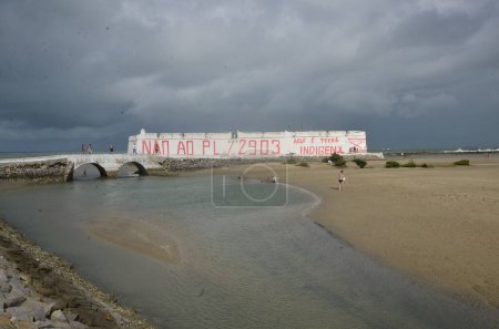 Photo for NATAL (RN), Brazil 09/07/2023 - Historical structure from the end of the 26th century dawned with graffiti this Thursday (7), on Brazil's independence day, with the words. 'NO TO PL /2903 ' and 'HERE IS INDIGENOUS LAND' - Royalty Free Image