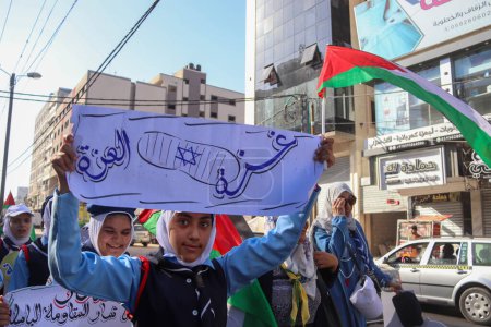 Photo for Palestinian children participate in a scouting march marking the anniversary of Israeli disengagement from Gaza. September 11, 2023, Gaza, Palestine - Royalty Free Image