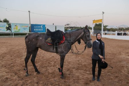 Photo for The Palestinian woman who advances her dream under the siege derives glory from her horses. The story of every horse has a dream with Salwa. September 12, 2023, Gaza, Palestine: At the beginning of the story, the strength and struggle to win - Royalty Free Image