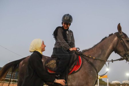 Photo for The Palestinian woman who advances her dream under the siege derives glory from her horses. The story of every horse has a dream with Salwa. September 12, 2023, Gaza, Palestine: At the beginning of the story, the strength and struggle to win - Royalty Free Image