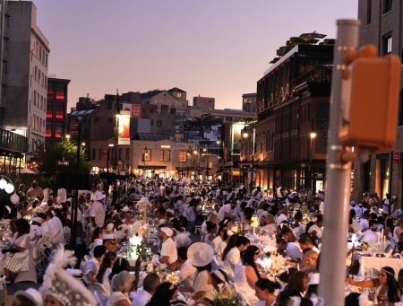 Photo for Diner en Blanc NYC 2023. September 14, 2023, Manhattan, New York, USA: New York's Meatpacking District transformed into a sea of elegance as Diner en Blanc NYC returned for its annual soiree - Royalty Free Image