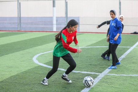 Photo for September 17, 2023 - Gaza, Palestine: Palestinian girls are seen training soccer at YMCA in Gaza city. - Royalty Free Image