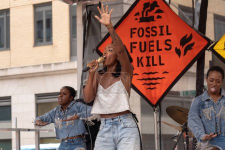 Photo for September 17, 2023 - New York, USA: Dawn Richards performs at a rally at the end of the March to End Fossil Fuels. Thousands march in New York to demand that Biden end fossil fuels; Amid U.N. Climate Summit. - Royalty Free Image