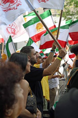 Photo for Iranian protesters gather in in front of UN headquarters. September 19, 2023, New York, USA: These protesters gathered to protest against Iran for the killing and torture of thousads of Iranian citizens since an uprising a year ago in 2022 - Royalty Free Image