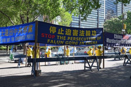 Photo for Protest of Chinese Falun Falun Dafa in front of UN in New York. September 21, 2023, New York: Protest of Chinese Falun Falun Dafa in front of UN in New York. Falun Gong or Falun Dafa is a new religious movement, founded by its leader Li Hongzhi - Royalty Free Image